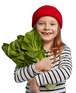 Little girl with salad